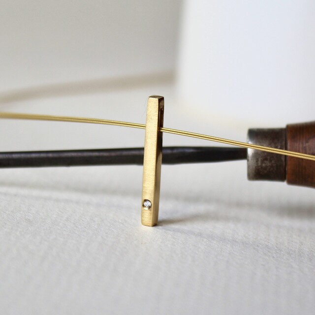 Colgante Nara Diamante y plata con baño de oro
