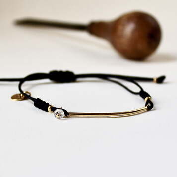 Pulsera AIDA en plata con baño de oro